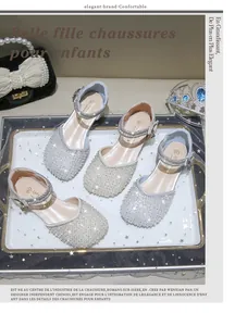 Detailed view of silver sequin princess shoes for girls with sparkling rhinestone embellishments