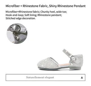 Detail of silver girls princess shoes featuring sparkling rhinestones and heart pendant