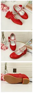Detailed views of red girls' princess shoes with silk bows and pearl-embellished straps