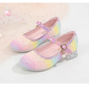 Detailed view of rainbow glitter girls' princess shoe with pearl charm and crystal heel