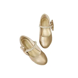 Elegant girls champagne gold Mary Jane shoes with pearl strap and bow detail