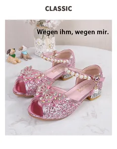 Detail of pink sequin sandals for girls with a rhinestone bow and pearl ankle strap