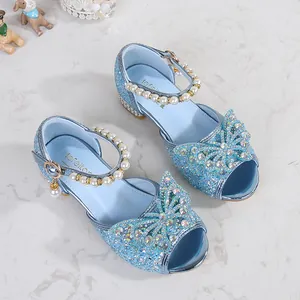 Sparkly blue girls princess sandals with crystal bow and pearl ankle strap details