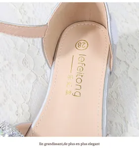 Detail of silver sequin princess shoes showing padded inner sole and size 28 mark