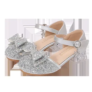 Sparkly silver sequin princess shoes for girls featuring a bow and crystal high heels