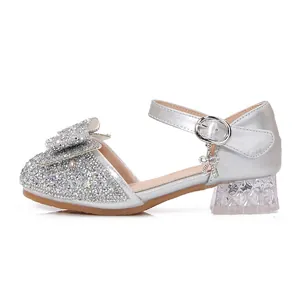 Sparkly silver girls princess shoes with glitter bow and transparent crystal heels