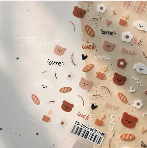 Detailed view of TS-3858 nail art stickers featuring cute brown autumn bears and flowers
