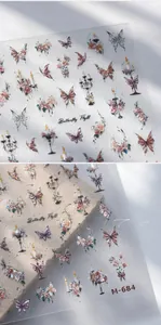 Detail of M-684 nail stickers featuring bronze butterflies and rose pink floral patterns