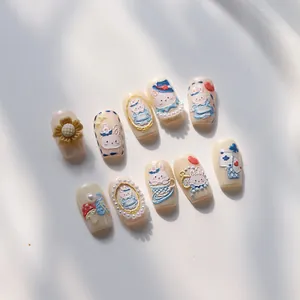 3D embossed Alice style press-on nails with blue rabbit, sunflower and heart designs