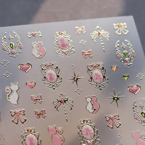 Pink gold foil nail stickers with butterfly bow and cat designs in baroque style