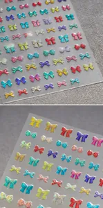 Macro detail of M-650 3D glitter bow nail art stickers with aurora laser finish