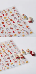 Detail of 5D embossed snake year nail stickers with cartoon lion and koi fish designs