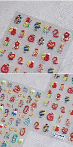 Vista detallada de pegatinas 3D en relieve para uñas con serpientes y patrones festivos
