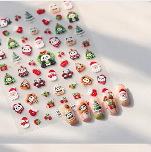 Detailed 5D embossed Christmas nail stickers featuring pandas, Santa, and trees
