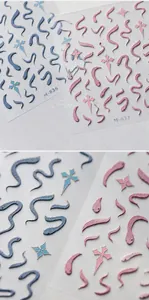Detailed relief texture of snake and star nail stickers in blue and pink matte finish