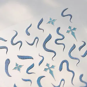 Holographic blue snake nail stickers with cross and star patterns in laser glitter finish