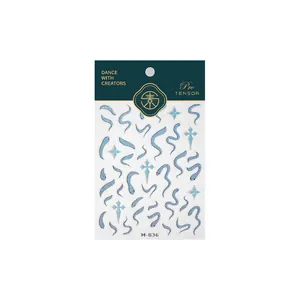 Blue glitter nail stickers with cartoon snake and wave patterns, model M-836