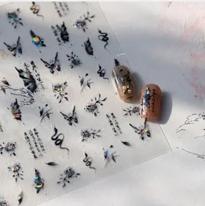Detail of M-660 nail art stickers with laser snake, butterfly and rose motifs