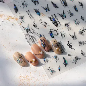 Ink butterfly nail stickers with gold stamping and laser holographic effect on nude nails