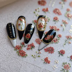 Matte floral nail stickers featuring red peonies and gold calligraphy on nails