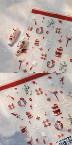 Detail of Forbidden City plum blossom embossed nail stickers with red and gold motifs