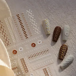 5D embossed knit texture nail art stickers with vintage sweater patterns and gold accents