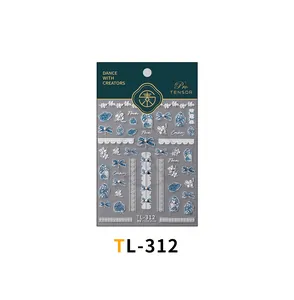Detailed view of TL-312 nail art stickers with lace, floral, and blue bow patterns