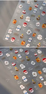 Detail showing 3D embossed Christmas nail stickers with Santa Claus and snowflake patterns