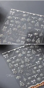 Dettaglio macro di adesivi per unghie natalizi 5D con fiocchi di neve e trame 3D