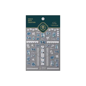 3D embossed nail stickers featuring blue bows and pearls on a professional TL-312 pack