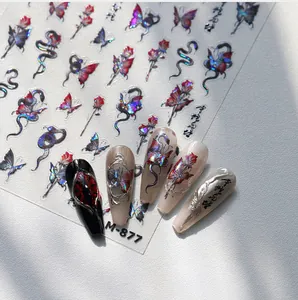 Detailed view of M-877 laser holographic nail stickers with butterfly and rose designs