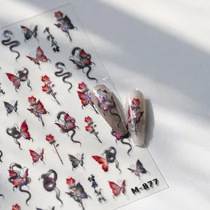 Macro detail of M-877 nail stickers featuring holographic roses, snakes and butterflies