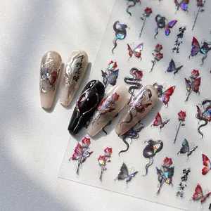 Holographic nail art stickers featuring butterfly, rose and snake patterns on nails