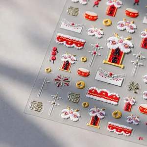 Macro detail of 5D embossed nail stickers featuring traditional Chinese New Year lion dance