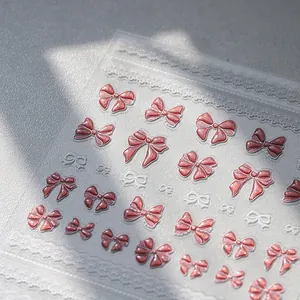 Stereoscopische M-850 nagelstickers met roze glitterstrikjes en witte kantpatronen