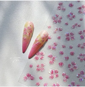 Adesivi per unghie 3D con fiori di ciliegio rosa e dettagli in rilievo iridescenti