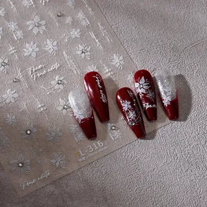 3D white flower nail stickers with rhinestones on red and silver glitter nails