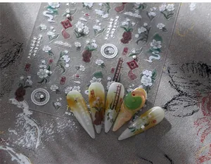 Detail of 3D retro pearl nail art stickers with white flowers and Chinese calligraphy