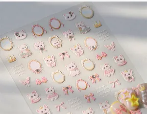 Detailed 3D embossed nail art stickers featuring cute white cats and pink bows