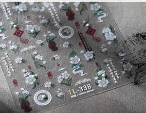 Detail view of TL-338 nail art stickers featuring white pear blossoms and Chinese calligraphy