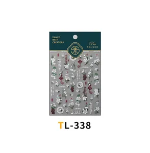 Detailed macro view of TL-338 3D embossed nail stickers with white flowers and green leaves