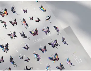 Macro shot of TL-322 butterfly nail art stickers with laser finish and 3D pearl details