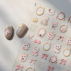 5D embossed nail art stickers featuring cute white cats and pink bows on a white surface