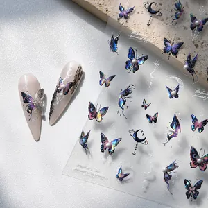 Holographic butterfly nail stickers with 3D pearl accents on long almond press-on nails