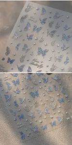 Macro view of 3D holographic butterfly nail stickers with iridescent laser finish