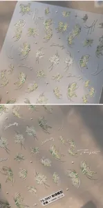 Macro detail of TS-3997 3D embossed nail art stickers with green butterfly and gold floral