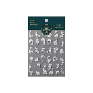 Minimalist white 3D flower and pearl nail art stickers set with bow designs on card
