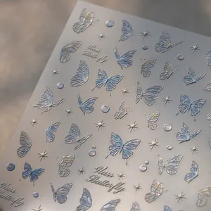 3D butterfly nail stickers with iridescent blue and purple gradient glass texture