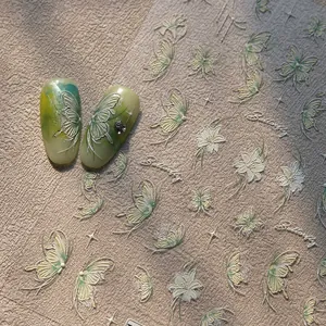 Stereo 3D butterfly and floral nail stickers with green translucent finish and silver outlines