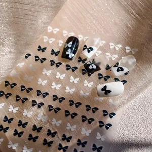 Elegante schwarz-weiße Schleifen-Nagelaufkleber mit französischen 3D-Klebe-Nagel-Decals